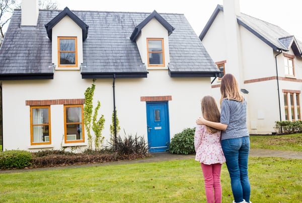 mother-daughter-standing-lawn-1