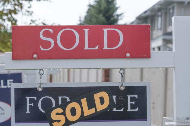 sold-real-estate-sale-signs-street-1